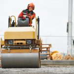 Light vibration roller compactor at urban road construction and repairing asphalt pavement works